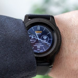 Smart chronograph watch on a mans wrist.