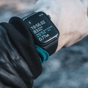 Large screen smart watch on a mans wrist.