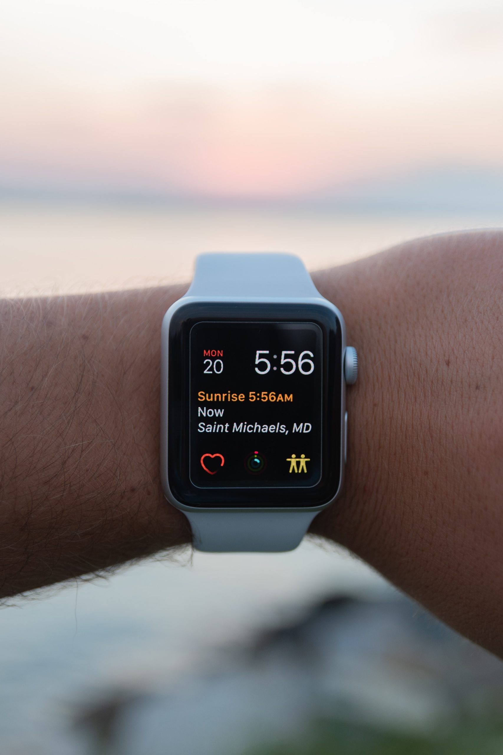 Wrist wearing a Heart tracker Smart watch by Ignite with a white band.
