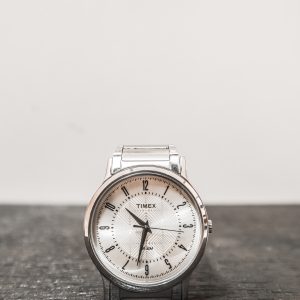 Timex Stainless Steel watch with a art deco pearl face and silver details.