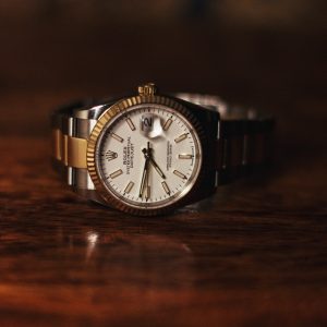 A silver and gold banded Rolex Oyster Perpetual Datejust watch.